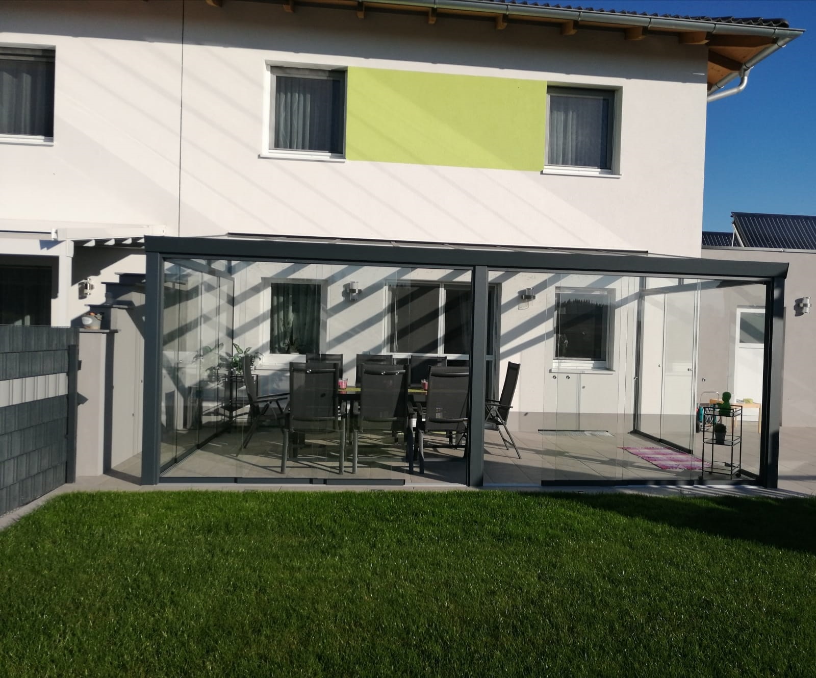 Gartenzimmer mit Glasschiebewaenden 8mm